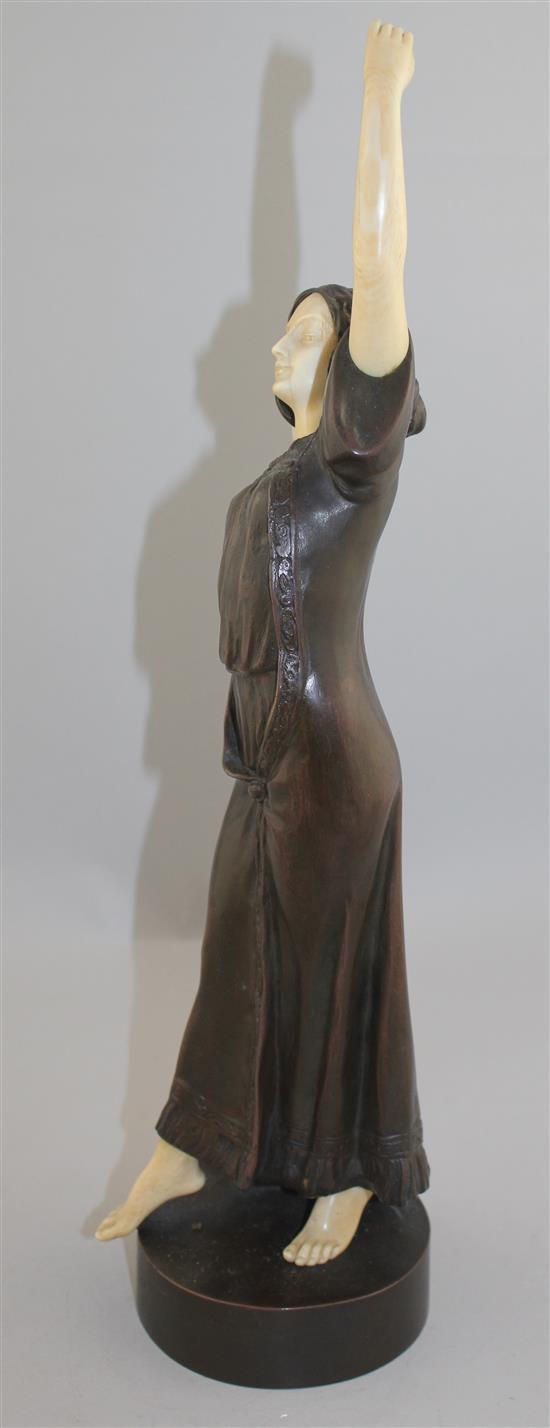 Peter Tereszczuk (Austrian, 1875-1963). A patinated bronze and ivory figure of a young lady dancing, 16.75in.